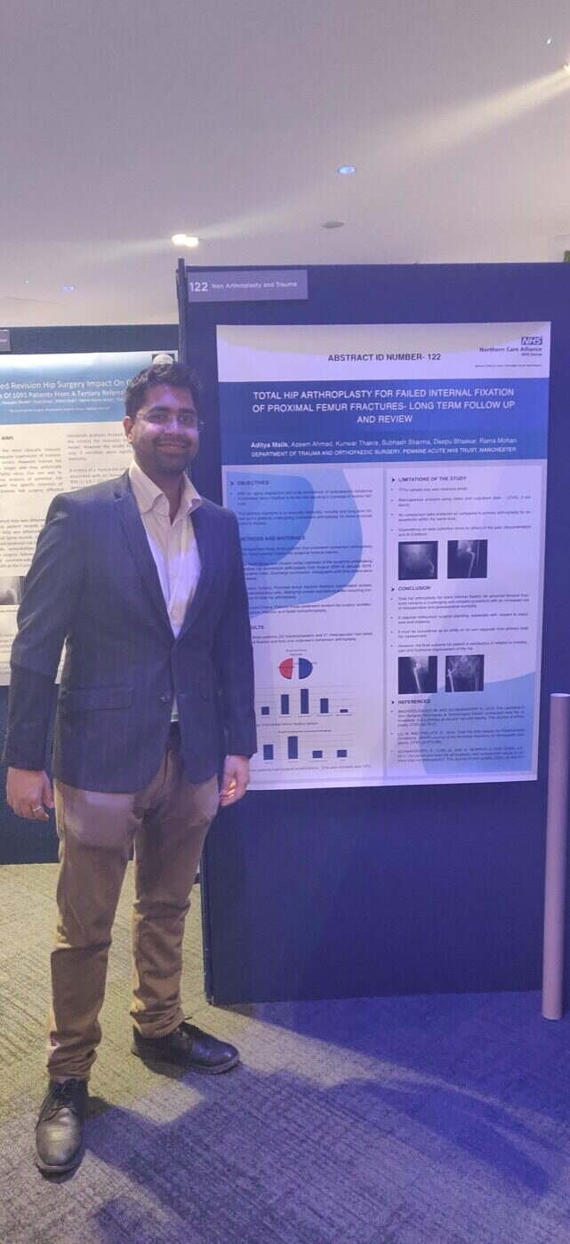 Dr Aditya Malik with his poster at the British Hip Society meeting, Wales, 2020